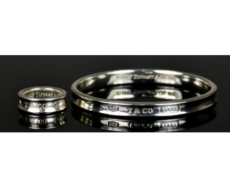 A Matching Silver Bangle and Ring, by Tiffany &amp; Co., Model Concave, bracelet 190mm circumference, ring size M, total gros