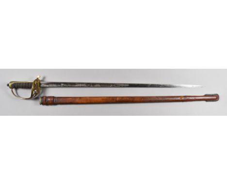 A George V Officers Dress Sword, etched steel blade, 32ins, army medical corps, gilt metal guard and back, wire bound grip, b