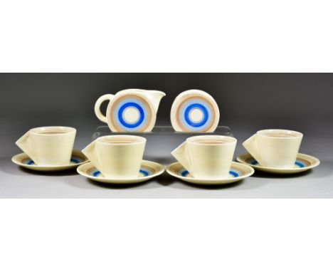 A Clarice Cliff Bonjour Liberty Stripe Part Tea Service, decorated in pale blue and cafe au lait bands on a cream ground, com