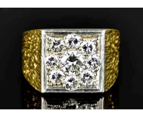 A Gentleman's 18ct Gold Diamond Set Ring, 20th Century, set with a centre brilliant cut white diamond, approximately .75ct, s