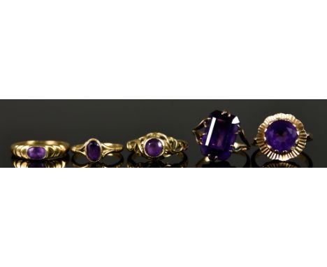 A Mixed Lot of 9ct Gold Amethyst Set Rings, sizes, H,M,K,H,J, total gross weight 14.5g