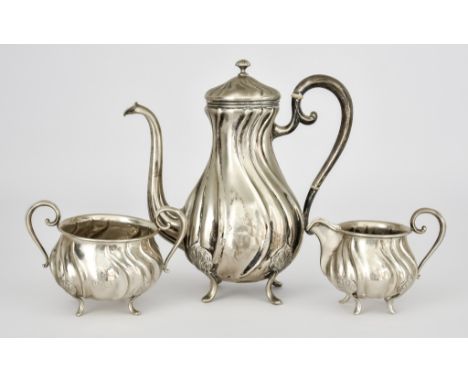 A Norwegian Silvery Metal Three-Piece Coffee Service stamped 830 standard, of baluster reeded form with scroll handles and on