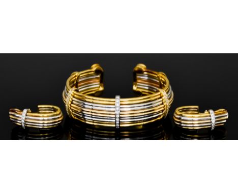 A Bi-Coloured 18ct Gold Bangle and Earrings, Modern, comprising - three-coloured gold bracelet in the Greek style, set with t