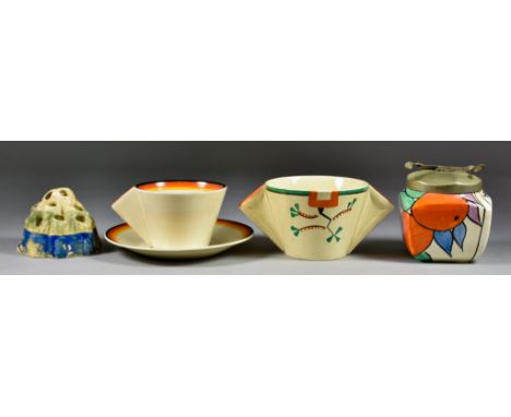 A Selection of Clarice Cliff Ceramics, comprising - a conical cup and saucer decorated in bands of yellow, orange, red and bl