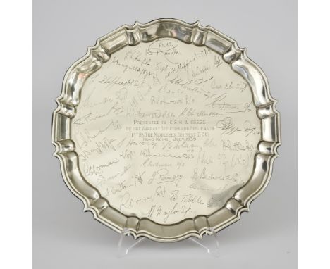 A Chinese Silvery Metal Circular Regimental Salver by W K, stamped 90 Standard, with shaped and moulded rim, inscription to c