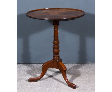 A George III Circular Tripod Occasional Table, with moulded tray top, turned central column, on cabriole legs with pad feet, 