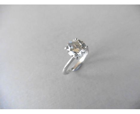 2.04ct diamond solitaire ring set in 18ct white gold. K colour and I1 clarity. High 4 claw setting, size M. Hallmarked 750. V