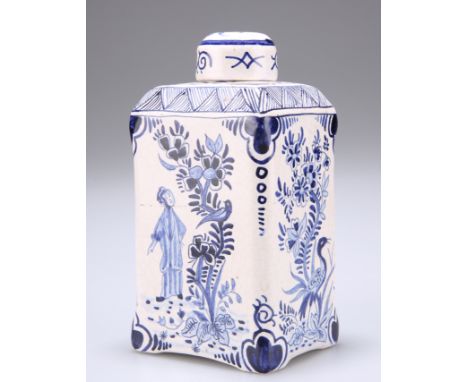 A DUTCH DELFT BLUE AND WHITE TEA CADDY AND COVER, c.1800,&nbsp;painted to two sides with a female figure under a tree, the sh
