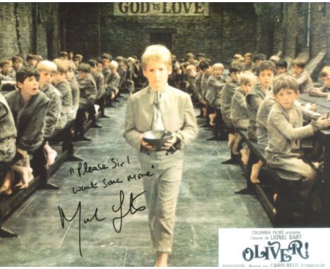Oliver! Movie photo signed by Mark Lester who has also added the legendary 'more please' quote, making this very desirable in