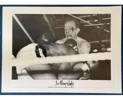 Sir Henry Cooper signed 19x14 black and white print pictured in action against Cassius Clay. Sir Henry Cooper OBE KSG (3 May 