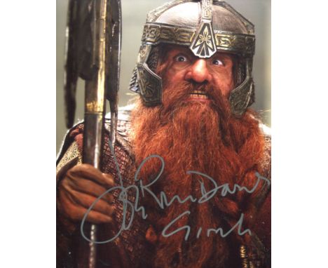 Lord of the Rings movie 8x10 photo signed by Jonathan Rhys-Davies as Gimli. Good condition. All autographs come with a Certif