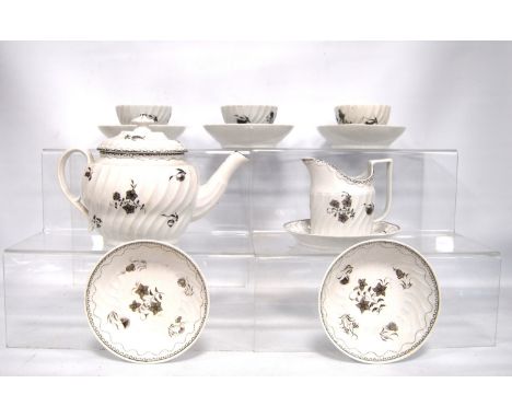 Late 18th century English porcelain part teaset decorated with monochrome flowers and Greek key border on ribbed body, compri