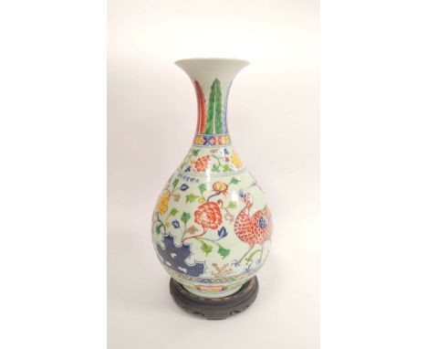 Chinese 20th century Qianlong revival porcelain vase of baluster shape, Decorated with colourful polychrome peacocks and wufu