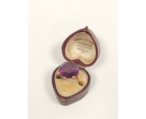 Amethyst ring in gold, '18ct' Size 'K', 7g gross. Width 15 mm Depth 9mm at stone.   