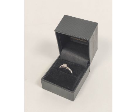 Diamond solitaire ring in 18ct white gold. Size 'K' 2.1g. 