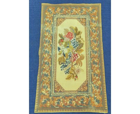Gros point tapestry rug, the polychrome central floral panel with cream ground, surrounded by stylised foliate border, 147cm 