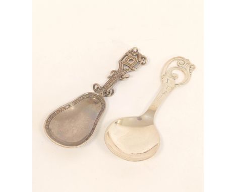 Silver caddy spoon of love spoon style, W H Haseler, Birmingham 1911 and another Danish 1941. 