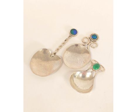 Two modern silver caddy spoons with blue enamel and another with chrysoprase cabochon. 