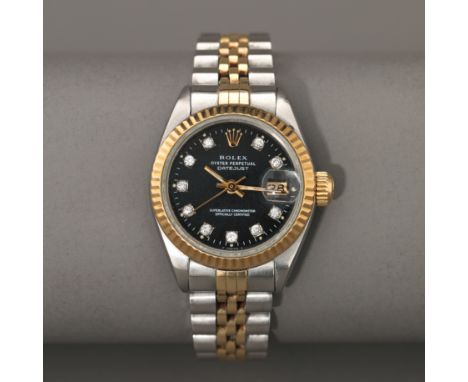 Rolex, Oyster Perpetual, Datejust. Ref. 69173.RolexChronometer. 18K Gold und Edelstahl. Gelbgold Lünette auf einem 26 mm groß