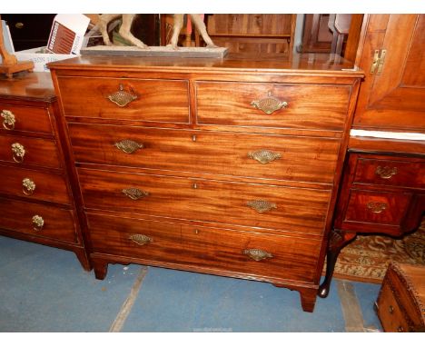 A Mahogany Chest of three long and two short Drawers having pierced fan-shaped backplate drop handles and standing on bracket