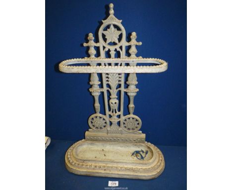 A Victorian cast iron Umbrella/Stick Stand, painted white, 25'' tall x 18'' wide.