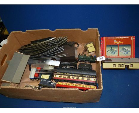 A good quantity of '00' gauge train track, rolling stock, buildings, etc., including Hornby Great Western 2733 engine, Airfix