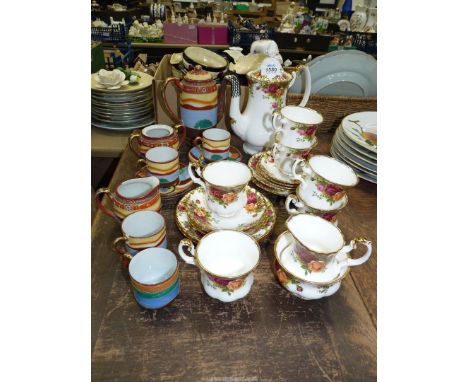 A Royal Albert Old Country Roses coffee set to include six cups &amp; saucers, four side plates, milk jug and sugar bowl, plu