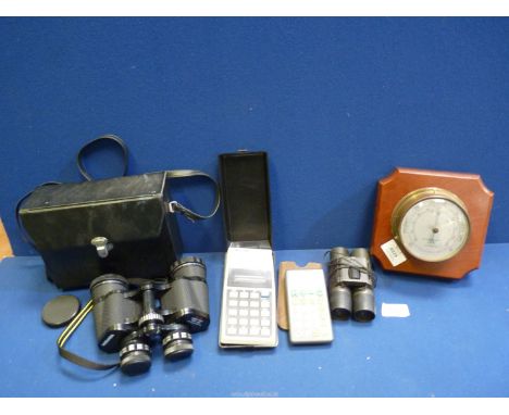 A cased pair of Miranda Binoculars 8 x 40, Sinclair calculator, Abacus calculator and Weathermaster Barometer.