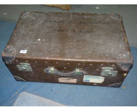 A large leather travel Trunk with metal fittings and leather handles, 30'' x 18'' x 12''.