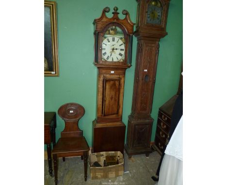 A cross-banded Oak Longcase Clock, the 30 hour movement having an arched painted face with depictions of farm cottages, the a