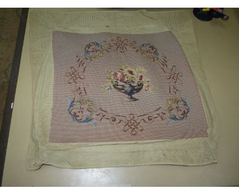 A tapestry and petit point worked Cushion cover, the work almost complete.