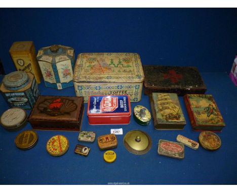 A large quantity of tins including two Chad Valley money boxes in the form of books, both with key, Ocean Queen blend coffee,