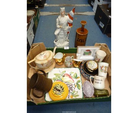 A quantity of china including Guernsey pottery Sultanas jar, Royal commemorative beakers, Crown Devon teapot and stand, etc.