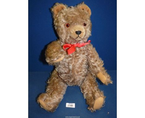 A vintage mohair teddy bear, 19'' tall.