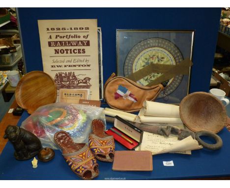 A quantity of miscellanea including wooden bowls, African staff, leather shoulder flask, souvenir photo albums etc.