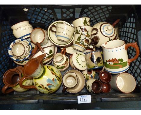 A quantity of Devon Ware china including cups, saucers, jugs, teapot etc.