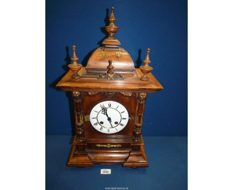 An attractive antique German Mantle clock in need of some restoration, 7" wide x  22" tall.