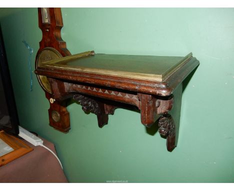 A dark Oak peg-joyned Wall Bracket/Shelf suitable for a bracket clock having a brass bead/up-stand and with unusual swivel ac