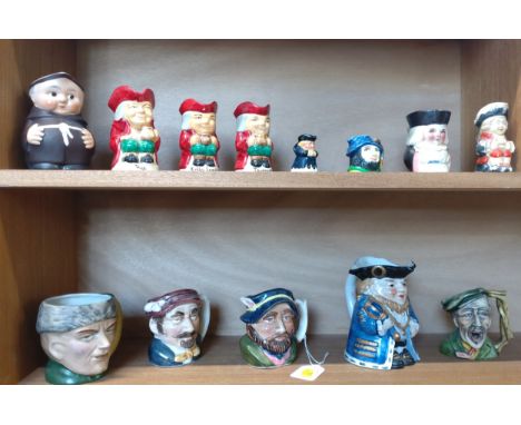 Thirteen ceramic character jugs 5cm to 13cm. (13) 