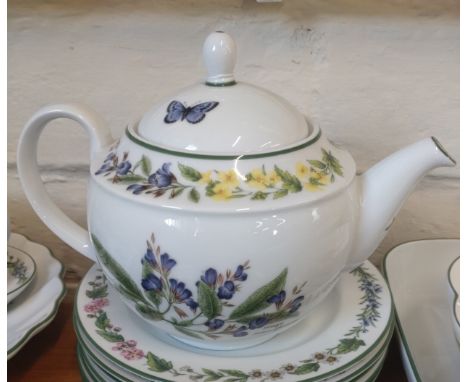 A Royal Worcester 'Herbs' pattern dinner service anbd teapot with sugar bowl and milk jug. (39) 