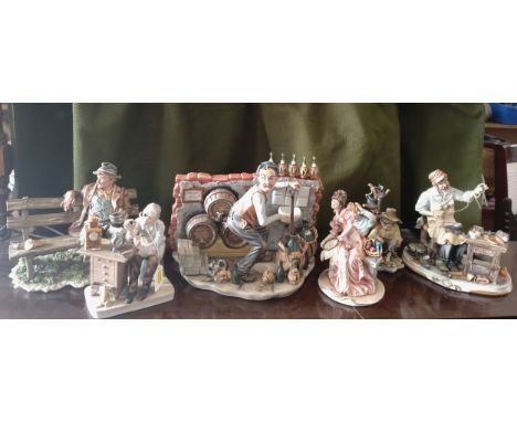 Five Capodimonte figure groups 16cm to 25cm high and a figure of a clock repairer 17.5cm high (6) 