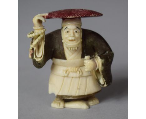An Early 20th Century Japanese Carved Netsuke in the Form of Hatted Gent, Decorated with Polychrome Colouration, Signed to Ba