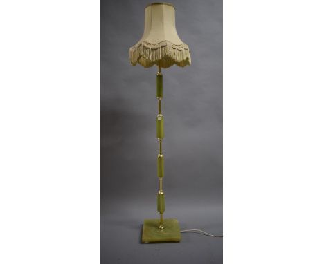A Brass and Onyx Effect Standard Lamp 