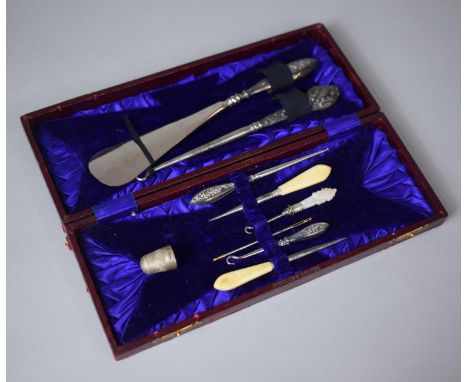 A Cased Collection of Silver Mounted Button Hooks, Shoe Horn and Manicure Tools 