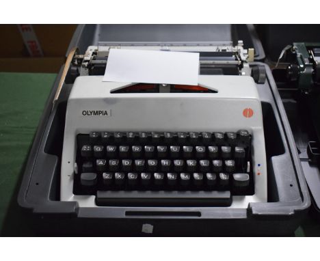 A Portable Olympia Manual Typewriter in Carrying Case 