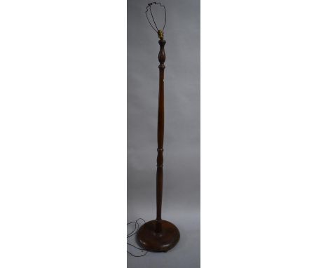 An Edwardian Turned Mahogany Standard Lamp, Fitting Requires Refixing 