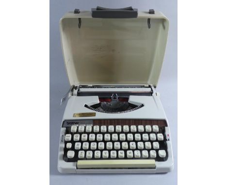 A Vintage Manual Portable Deluxe 900 Typewriter 