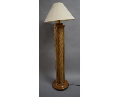 A Modern Rattan Style Standard Lamp and Shade 