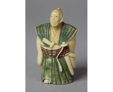 An Early 20th Century Japanese Carved Netsuke in the Form of a Scholar with Scroll in Hand Decorated with Polychrome Colourat