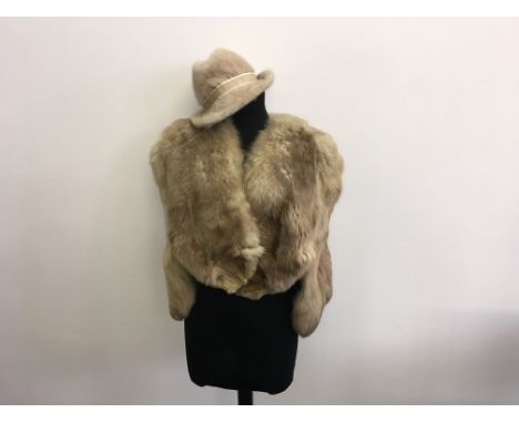 A Light brown fur shawl with trilby style hat by The Weald Furriers